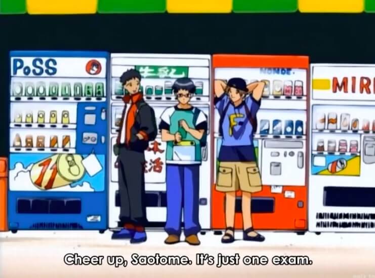 Saotome and his buddies standing in front of vending machines. It's very vibrant. Subtitles read, Cheer up, Saotome. It's just one exam. End subtitle.