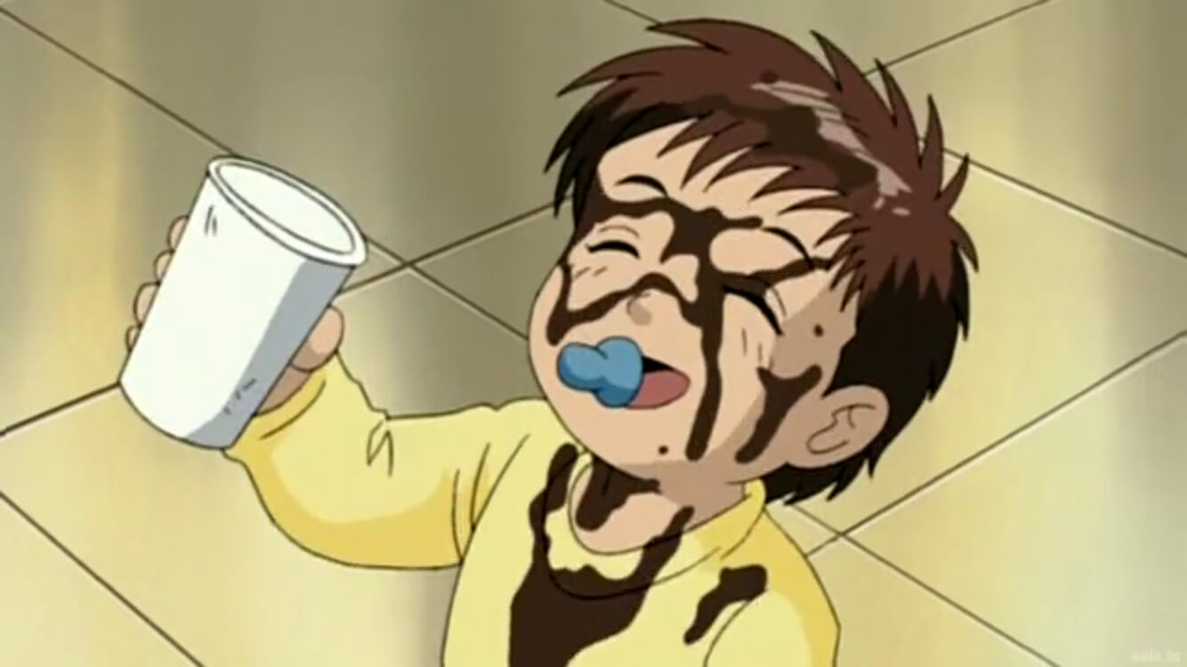 Baby Ryuta smiling after pouring coffee on himself.